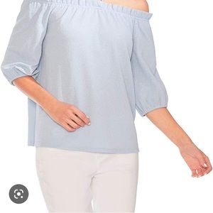 Vince Camuto Off the shoulder light blue top. Never been worn.